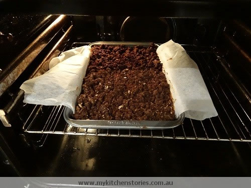Chocolate date Slice in the oven
