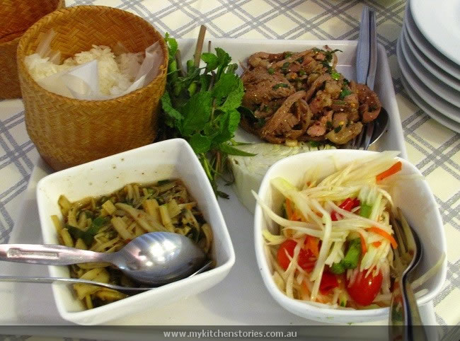 Pork, catfish salad, green papaya salad and bamboo salad