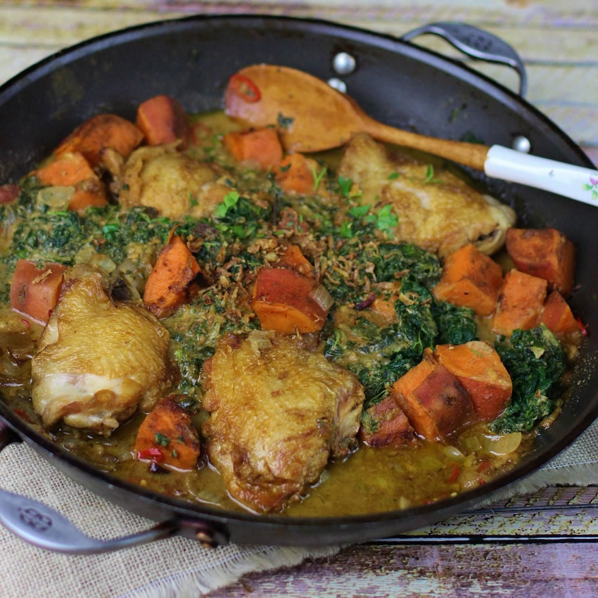 African Chicken baked in one pot with spinach and peanuts