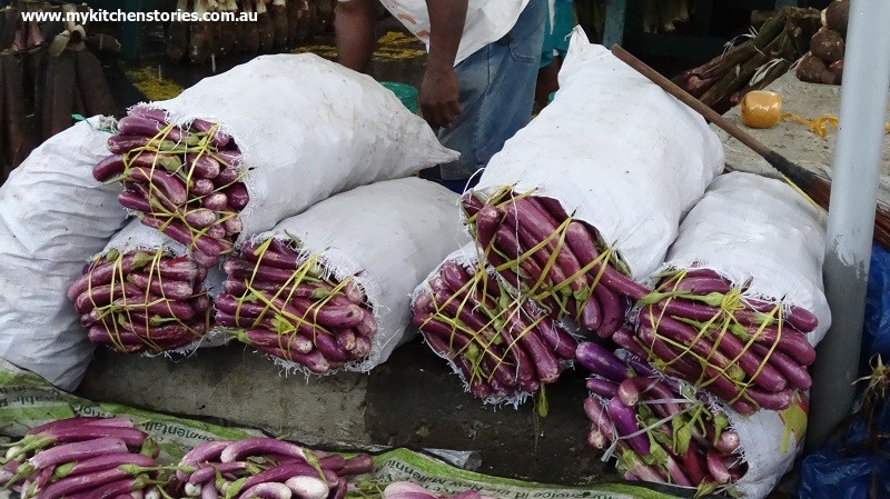 Cooking in Suva, buying eggplants