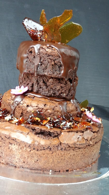 Brownie Cake stacked with chocolate and praline