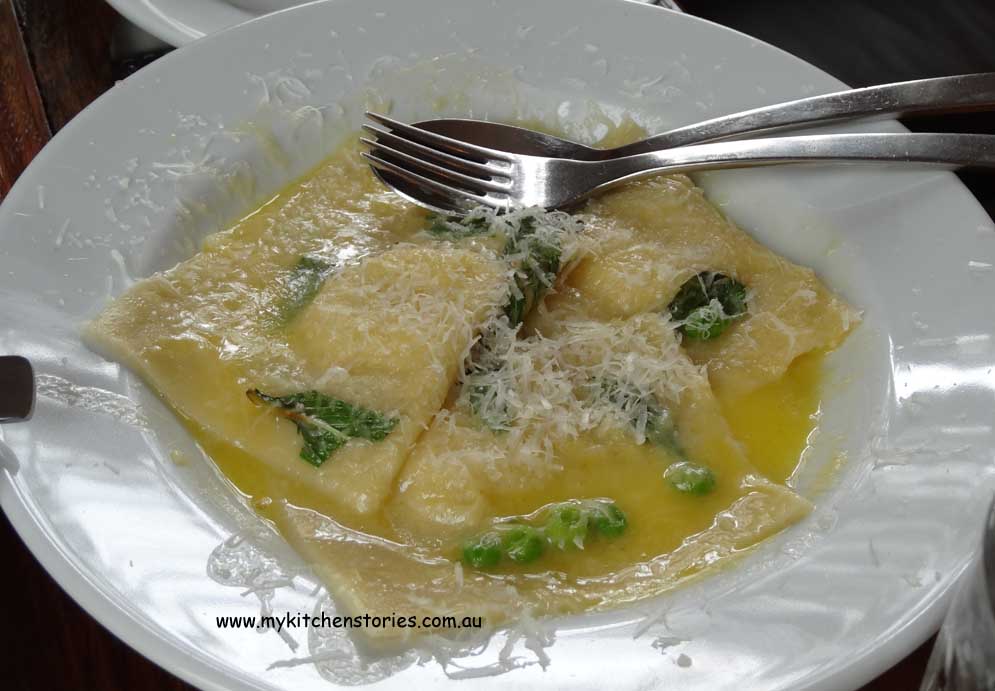 Ricotta ravioli with peas and mint