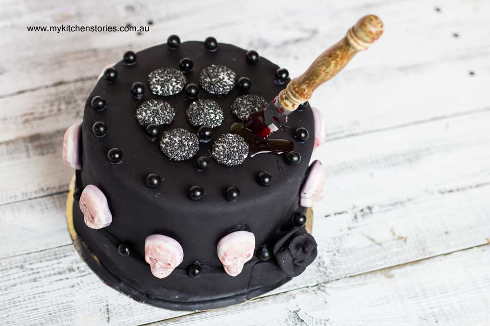Halloween Chocolate cake with skulls and beads