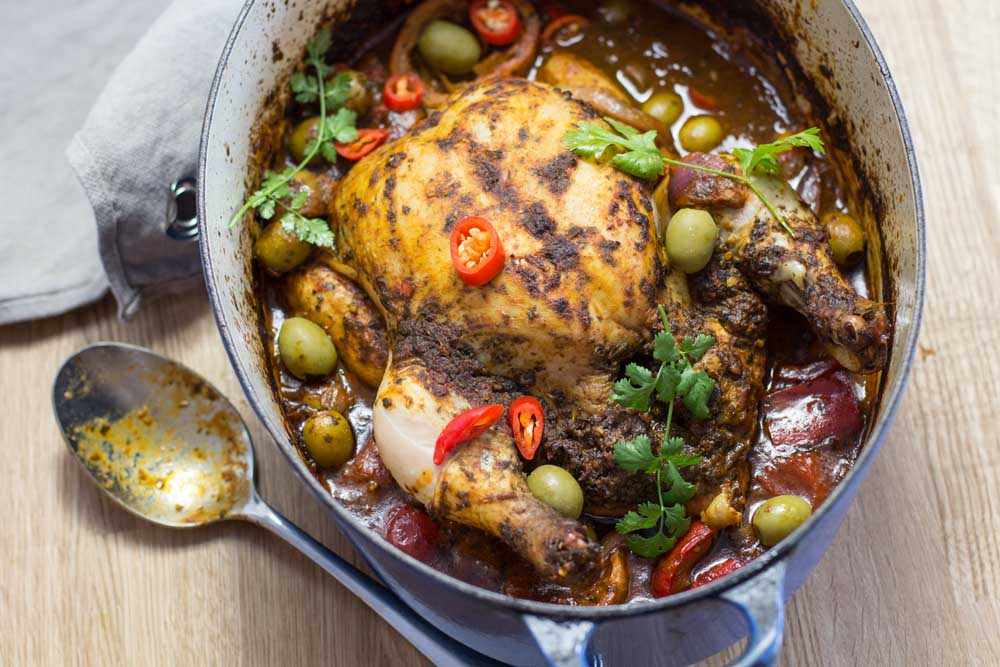 One Pot Chermoula Chicken in a blue Le Cruset