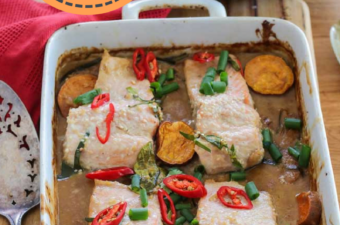 Tray baked salmon in a white dish