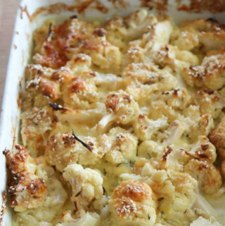 Cauliflower Cheese with Thyme in a white baking dish