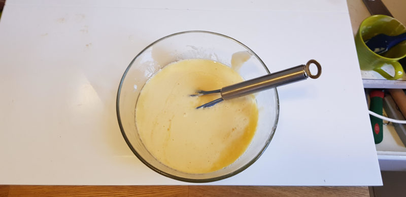 Mixing starter with other ingredients for a cake