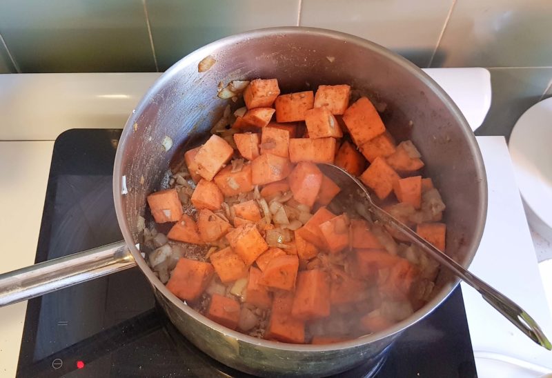 Sweating off sweet potato for stew