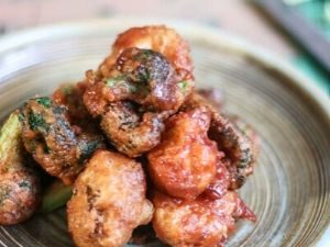 spicy fried vegetable wings on a plate