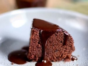 a chocolate cake with dripping sauce