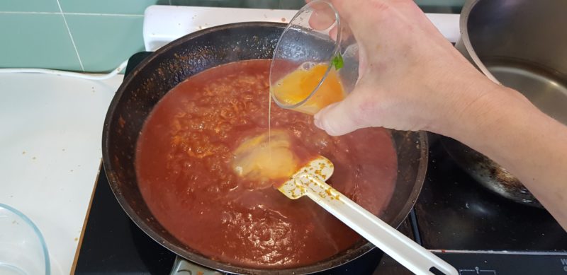 Fresh egg is added to the sauce to finish it