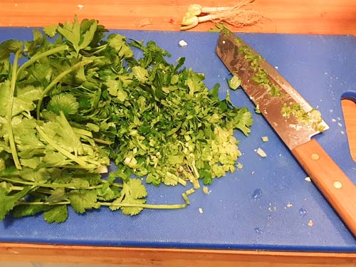Chopped parsley and coriander for cheese balls