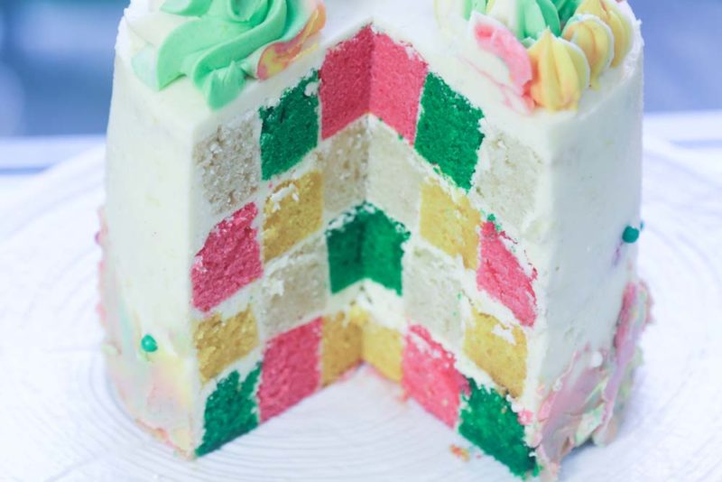 a cut checkerboard cake