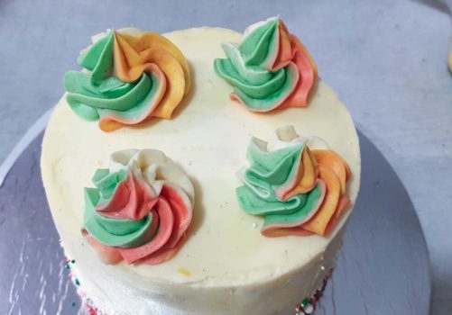 Pipe on the coloured buttercream