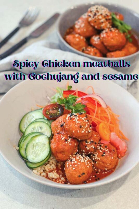 Spicy Chicken meatballs with Gochujang and sesame in a grey bowl