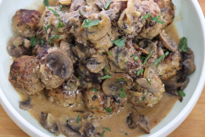 Meatballs with diane sauce and mushrooms
