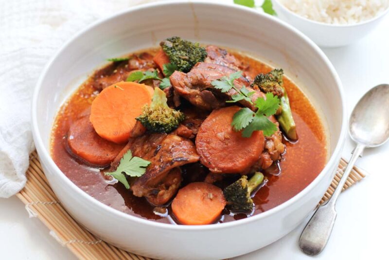Hoisin-chicken-thighs-in-a-white-dish-with-sweet-potato